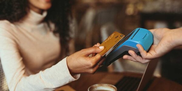 A patron making a credit card payment on an electronic payment system