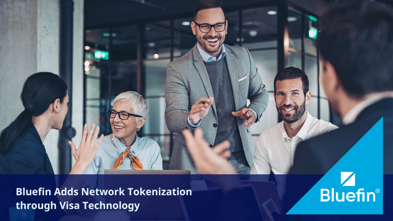 Business professionals speaking in a meeting room.